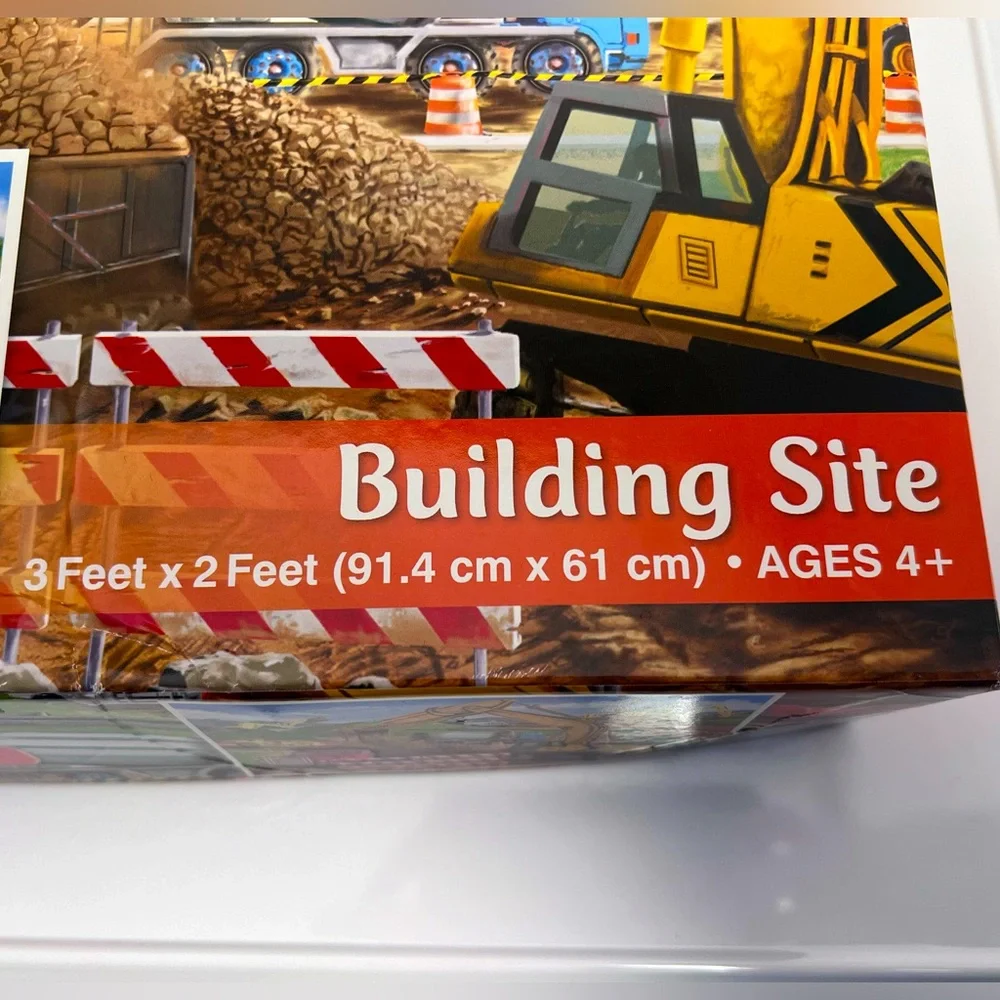 This 48 Piece Construction Site Floor Puzzle is for Ages 4+ by Melissa & Doug.